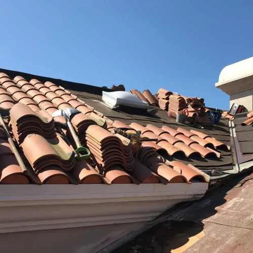 Couvreur Coufouleux rénovation d'une toiture en tuiles